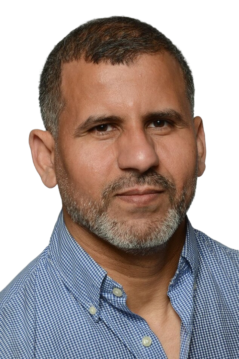 Professional headshot of Rejeb Zorgani, Founder and CTO of SAIA Digital, wearing business attire with a confident expression